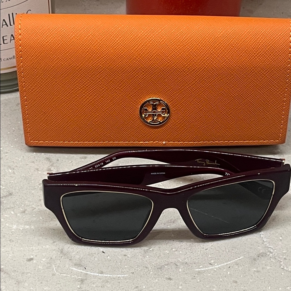 Tory Burch maroon with gold edge Sunglasses and Orange case